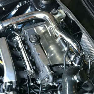 K03/K03s Charge pipe for passenger facing throttle body